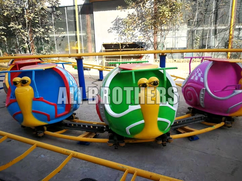 Amusement park snail design mini sliding roller coaster for sale